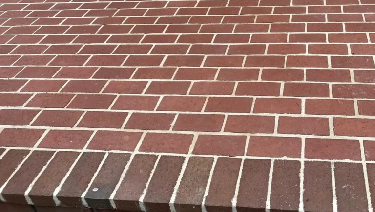 Brick patio and steps repointing after tuckpointing in York PA by LBE Masonry showing fresh white mortar joints